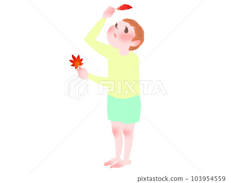 穿著黃色長袖T恤和短褲的赤腳男孩在陽光下看著秋葉和落葉 穿著黃色長袖T恤和短褲的赤腳男孩在陽光下看著秋葉和落葉 103954559