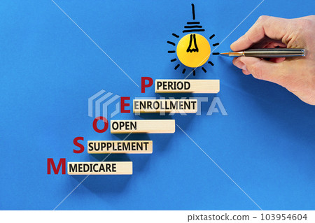 MSOEP symbol. Concept words MSOEP medicare supplement open enrollment period on wooden block. Beautiful blue background. Medical MSOEP medicare supplement open enrollment period concept. Copy space. 103954604