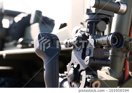 Control and optical sight of a multiple launch rocket system, close-up, military equipment Control and optical sight of a multiple launch rocket system, close-up, military equipment 103956594