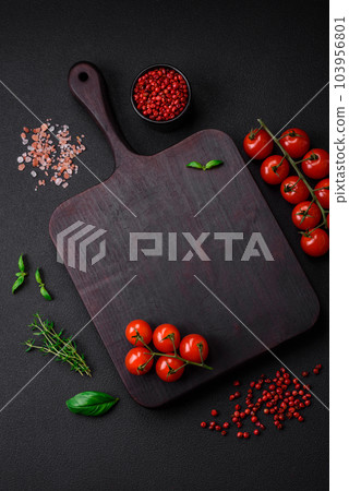 Ingredients for cooking cherry tomatoes, salt, spices and herbs 103956801