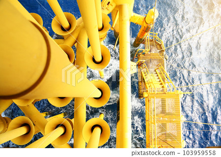 Offshore construction platform for production oil and gas. Oil and gas industry and hard work. Production platform and operation process by manual and auto function from control room. Offshore construction platform for production oil and gas. Oil and gas industry and hard work. Production platform and operation process by manual and auto function from control room. 103959558