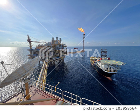 Offshore construction platform for production oil and gas. Oil and gas industry and hard work. Production platform and operation process by manual and auto function from control room. 103959564