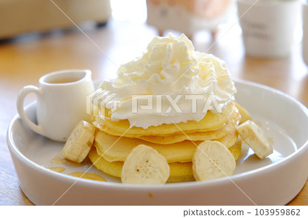 Pancake get served in the morning in the restaurant or the cafe. Food and drink set made by chef and served with hot drink. Healthy food or junk food was select by people. Pancake get served in the morning in the restaurant or the cafe. Food and drink set made by chef and served with hot drink. Healthy food or junk food was select by people. 103959862