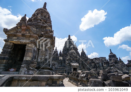 Prambanan Temple Complex (Sewu Temple) and blue sky in rainy season Prambanan Temple Complex (Sewu Temple) and blue sky in rainy season 103961049