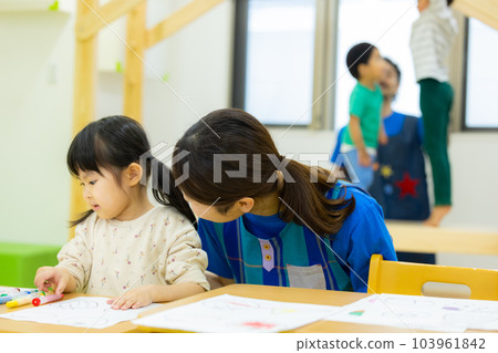 Nursery teacher, early childhood classroom, study Nursery teacher, early childhood classroom, study 103961842