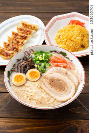 Tonkotsu ramen, dumplings and fried rice Tonkotsu ramen, dumplings and fried rice 103965702