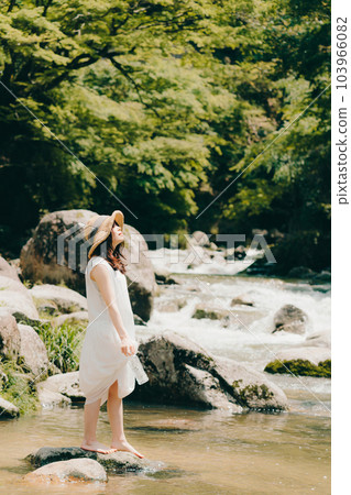 Photo of a woman in a river Photo of a woman in a river 103966082