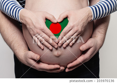 Bangladesh family concept. Man embracing pregnant woman belly and heart with flag Bangladesh family concept. Man embracing pregnant woman belly and heart with flag 103970136