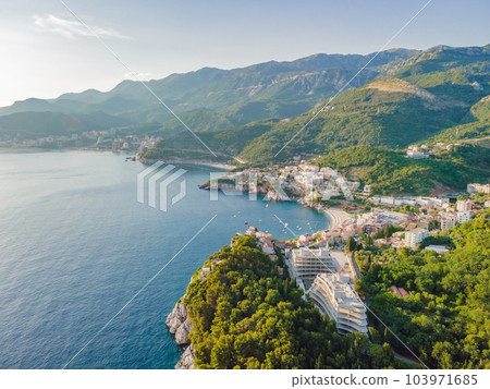 Queen's Beach in Milocer, Montenegro. Aerial view of sea waves and fantastic Rocky coast, Montenegro. drone 103971685