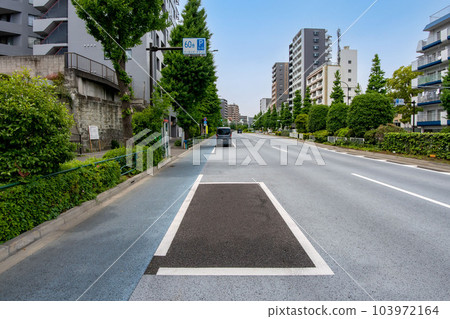 Bicycle-only road and on-street coin parking on Hakusan Street in Bunkyo Ward, Tokyo Bicycle-only road and on-street coin parking on Hakusan Street in Bunkyo Ward, Tokyo 103972164