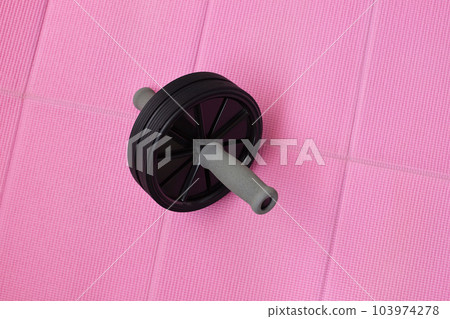 yoga mat and ab roller 103974278
