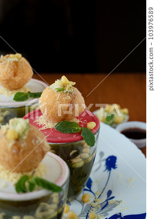 Food Photography of Indian street food, Pani-Puri, Ahmednagar, Maharashtra, India 103976589
