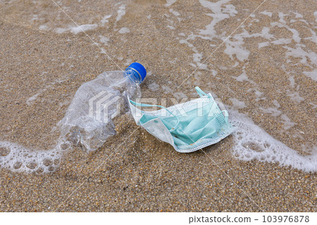 marine litter, ocean plastics and masks 103976878