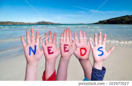 Children Hands Building Word Needs, Sea And Ocean Background 103977027