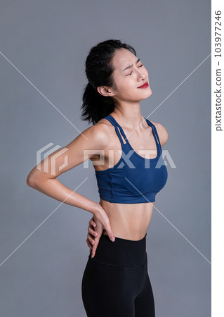 healthy beauty concept photo of korean asian beautiful woman feeling backache healthy beauty concept photo of korean asian beautiful woman feeling backache 103977246