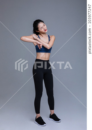 healthy beauty concept photo of korean asian beautiful woman feeling shoulder pain healthy beauty concept photo of korean asian beautiful woman feeling shoulder pain 103977247