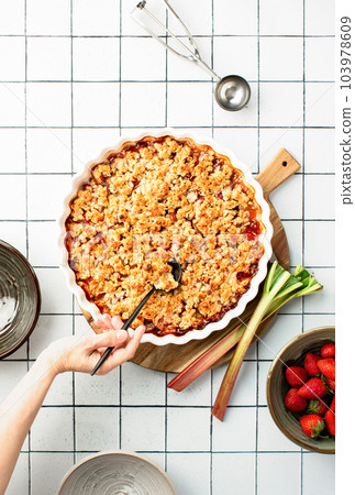 Rhubarb and strawberry cobbler, top down view 103978609