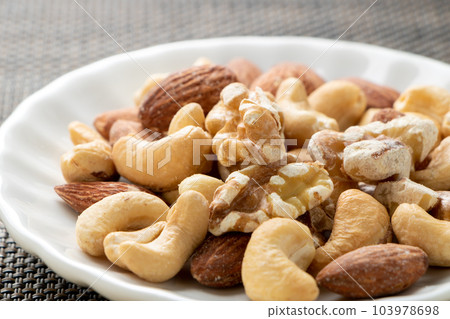 Mixed nuts (almonds, cashew nuts, walnuts). 103978698