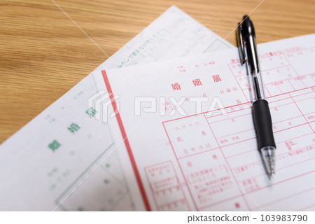 Marriage registration, divorce registration and ballpoint pen documents 103983790