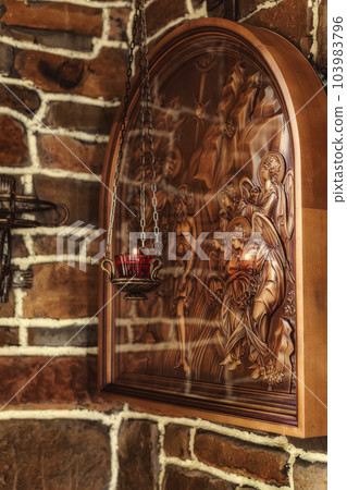 Three-dimensional icon on a Christian theme carved from wood 103983796