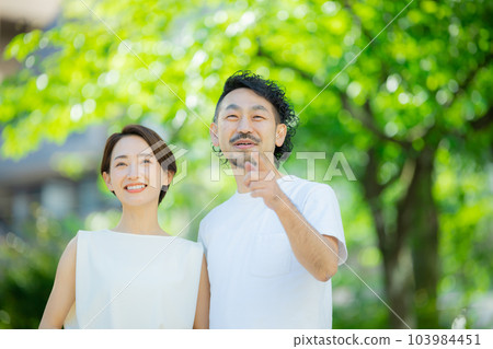 Middle couple outdoor Middle couple outdoor 103984451