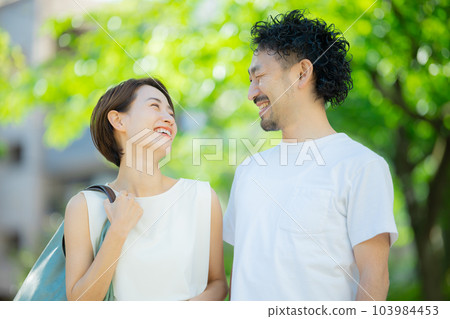 Middle couple outdoor 103984453