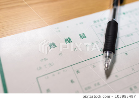 How to write a divorce notice A man writing with a ballpoint pen 103985497