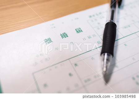 How to write a divorce notice A man writing with a ballpoint pen 103985498