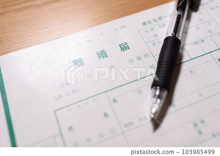 How to write a divorce notice A man writing with a ballpoint pen 103985499