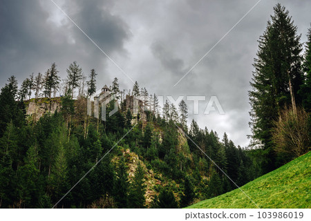 Mountain landscape in the Alps. Panoramic view of beautiful mountain landscape in the Bad Rippoldsau-Schapbach in the Black Forest, area near Burgbach Wasserfall, Baden-Wurttemberg, southern Germany. Mountain landscape in the Alps. Panoramic view of beautiful mountain landscape in the Bad Rippoldsau-Schapbach in the Black Forest, area near Burgbach Wasserfall, Baden-Wurttemberg, southern Germany. 103986019