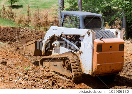 Territory allocated for construction improvement work will be utilized operating tractor on site Territory allocated for construction improvement work will be utilized operating tractor on site 103986180