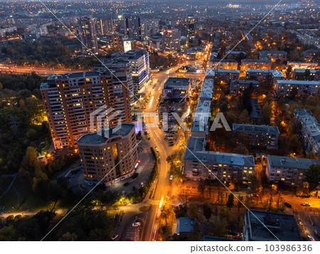 Aerial illuminated city at sunset, Kharkiv streets Aerial illuminated city at sunset, Kharkiv streets 103986336
