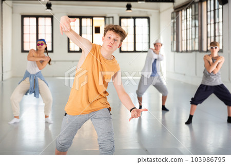 Group of young artists performing street dance 103986795