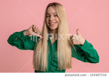 Excited young winner woman girl feeling very proud pointing hisself, overjoyed by success victory 103987538