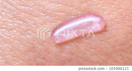 Collagen And Hyaluron Serum Gel On Skin. Splashing of Hyaluron gel. Liquid hyaluronic acid gel on skin. Cosmetic bubbles Gel texture on skin black background. Textured background. skin care product Collagen And Hyaluron Serum Gel On Skin. Splashing of Hyaluron gel. Liquid hyaluronic acid gel on skin. Cosmetic bubbles Gel texture on skin black background. Textured background. skin care product 103988121