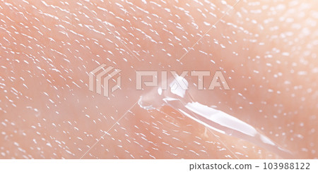 Collagen And Hyaluron Serum Gel On Skin. Splashing of Hyaluron gel. Liquid hyaluronic acid gel on skin. Cosmetic bubbles Gel texture on skin black background. Textured background. skin care product Collagen And Hyaluron Serum Gel On Skin. Splashing of Hyaluron gel. Liquid hyaluronic acid gel on skin. Cosmetic bubbles Gel texture on skin black background. Textured background. skin care product 103988122