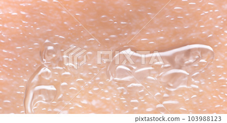Collagen And Hyaluron Serum Gel On Skin. Splashing of Hyaluron gel. Liquid hyaluronic acid gel on skin. Cosmetic bubbles Gel texture on skin black background. Textured background. skin care product Collagen And Hyaluron Serum Gel On Skin. Splashing of Hyaluron gel. Liquid hyaluronic acid gel on skin. Cosmetic bubbles Gel texture on skin black background. Textured background. skin care product 103988123