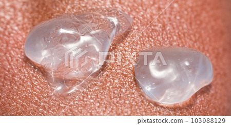 Collagen And Hyaluron Serum Gel On Skin. Splashing of Hyaluron gel. Liquid hyaluronic acid gel on skin. Cosmetic bubbles Gel texture on skin black background. Textured background. skin care product Collagen And Hyaluron Serum Gel On Skin. Splashing of Hyaluron gel. Liquid hyaluronic acid gel on skin. Cosmetic bubbles Gel texture on skin black background. Textured background. skin care product 103988129