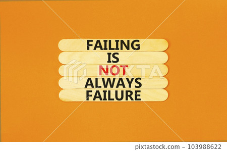 Failure or failing symbol. Concept words Failing is not always failure on wooden stick. Beautiful orange table orange background. Business, failure or failing concept. Copy space. 103988622
