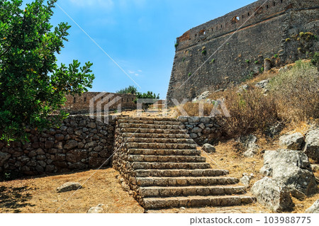 Nafplio, Greece Palamidi fortification staircase detail before the bastion on a bright summer day. Nafplio, Greece Palamidi fortification staircase detail before the bastion on a bright summer day. 103988775