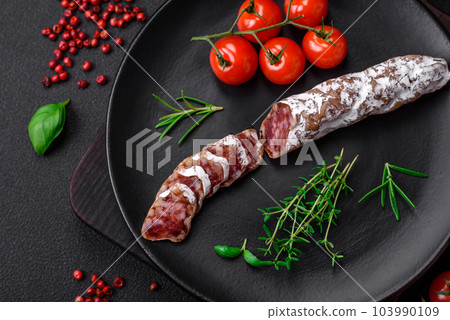 Delicious fresh smoked fuet sausage with salt, spices and herbs 103990109