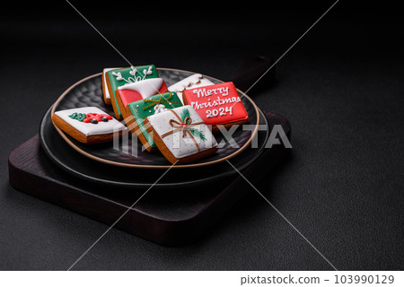 Delicious fresh sweet Christmas gingerbread with festive ornaments 103990129