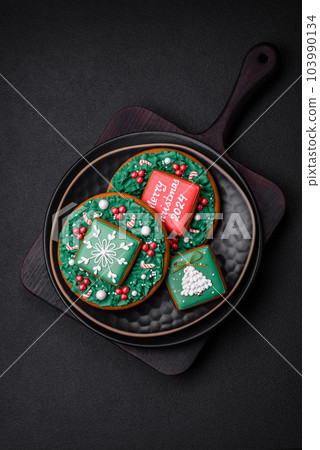 Delicious fresh sweet Christmas gingerbread with festive ornaments 103990134