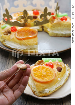 Roscon de Reyes, broad beans from inside Roscon de Reyes, broad beans from inside 103990323