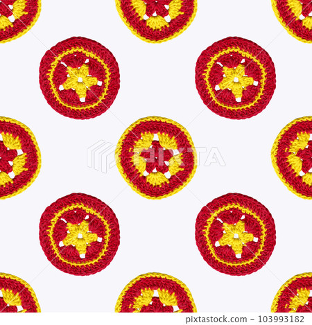 Decorative composition of multicolored knitted circles. Handmade patterns. Seamless pattern on white background 103993182
