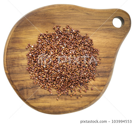 gluten free red quinoa grain on a mini wooden cutting board isolated on white gluten free red quinoa grain on a mini wooden cutting board isolated on white 103994553