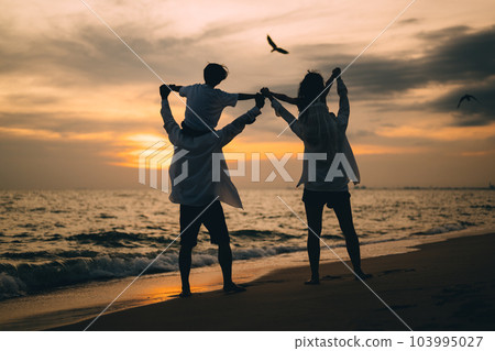 Happy Asian family travel on beach on holiday 103995027