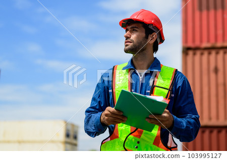 Warehouse engineer worker working at industrial container yard 103995127