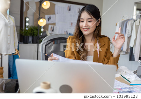 Female designer business owner, Tailoring business owner Female designer business owner, Tailoring business owner 103995128
