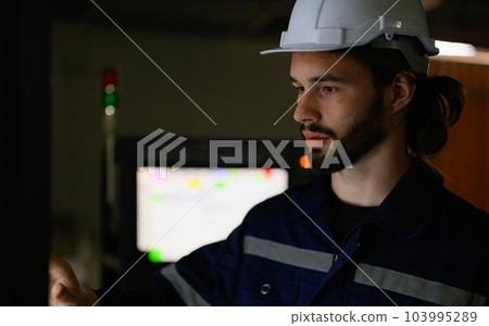Professional technician checking and repairing part of automatic machine Professional technician checking and repairing part of automatic machine 103995289